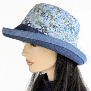 Sunblocker UV summer sun hat with wide brim, blue daisy print, adjustable fit